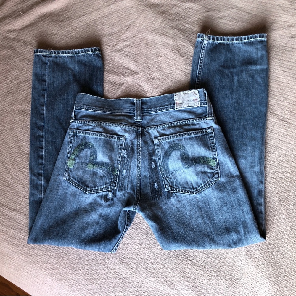 EVISU x PUMA distressed jeans button fly